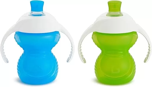 Two Munchkin Bite-Proof trainer cups. A blue one and a green one, with handles.